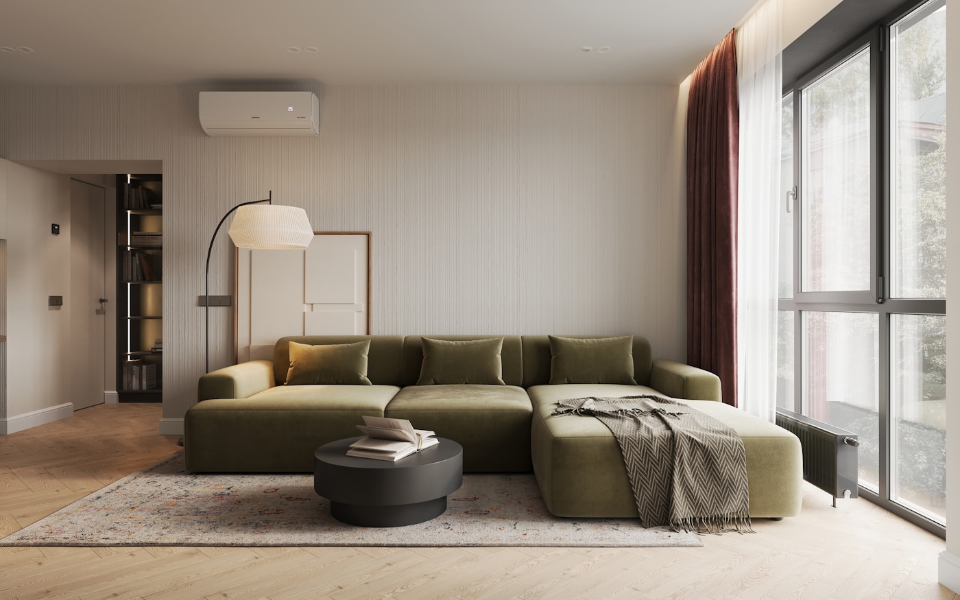 A bright, airy apartment living room with large windows